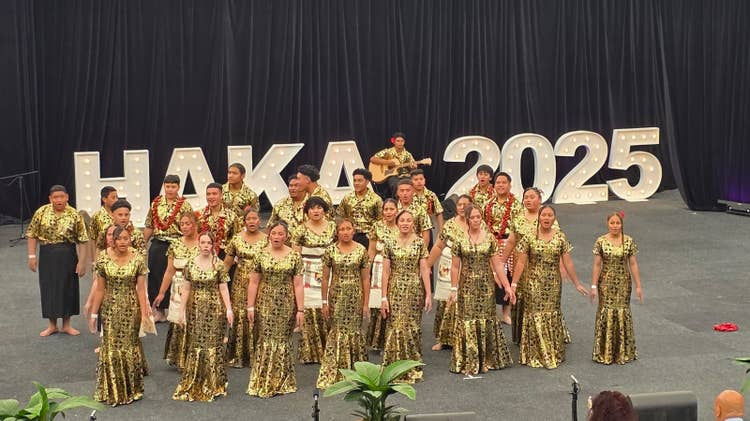 Image of students on stage for their Haka Warriors performance